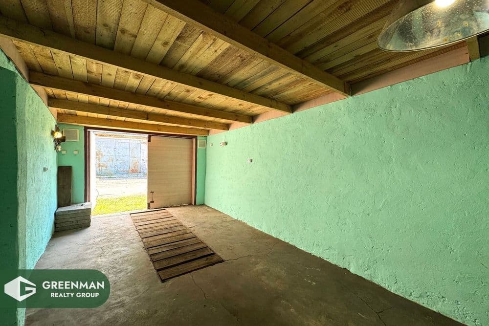 Чистый аккуратный гараж | Агентство недвижимости Greenman Realty Group
