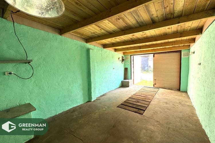 Чистый аккуратный гараж | Агентство недвижимости Greenman Realty Group